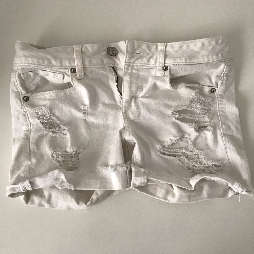 American Eagle White Distressed Midi Shorts